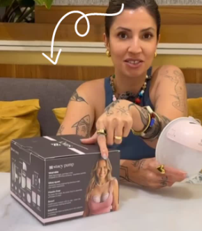 Woman holding a product with a box featuring a similar product image.